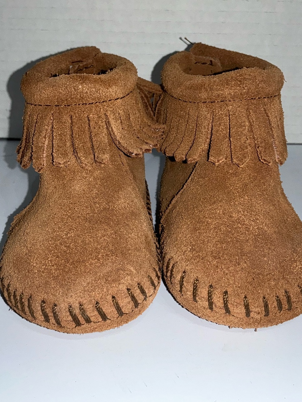 Minnetonka Infant 2 Suede Moccasin Booties cozy fringe boho